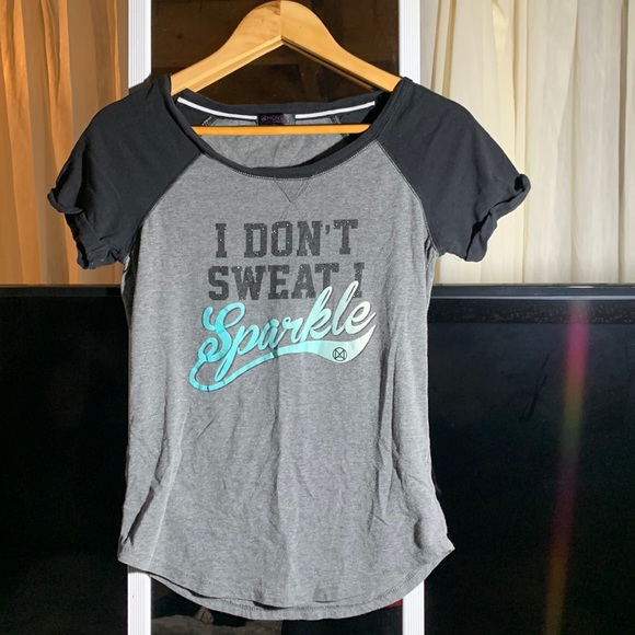 Well loved T-shirt in fair condition. Looks really cute on. - Picture 1 of 2